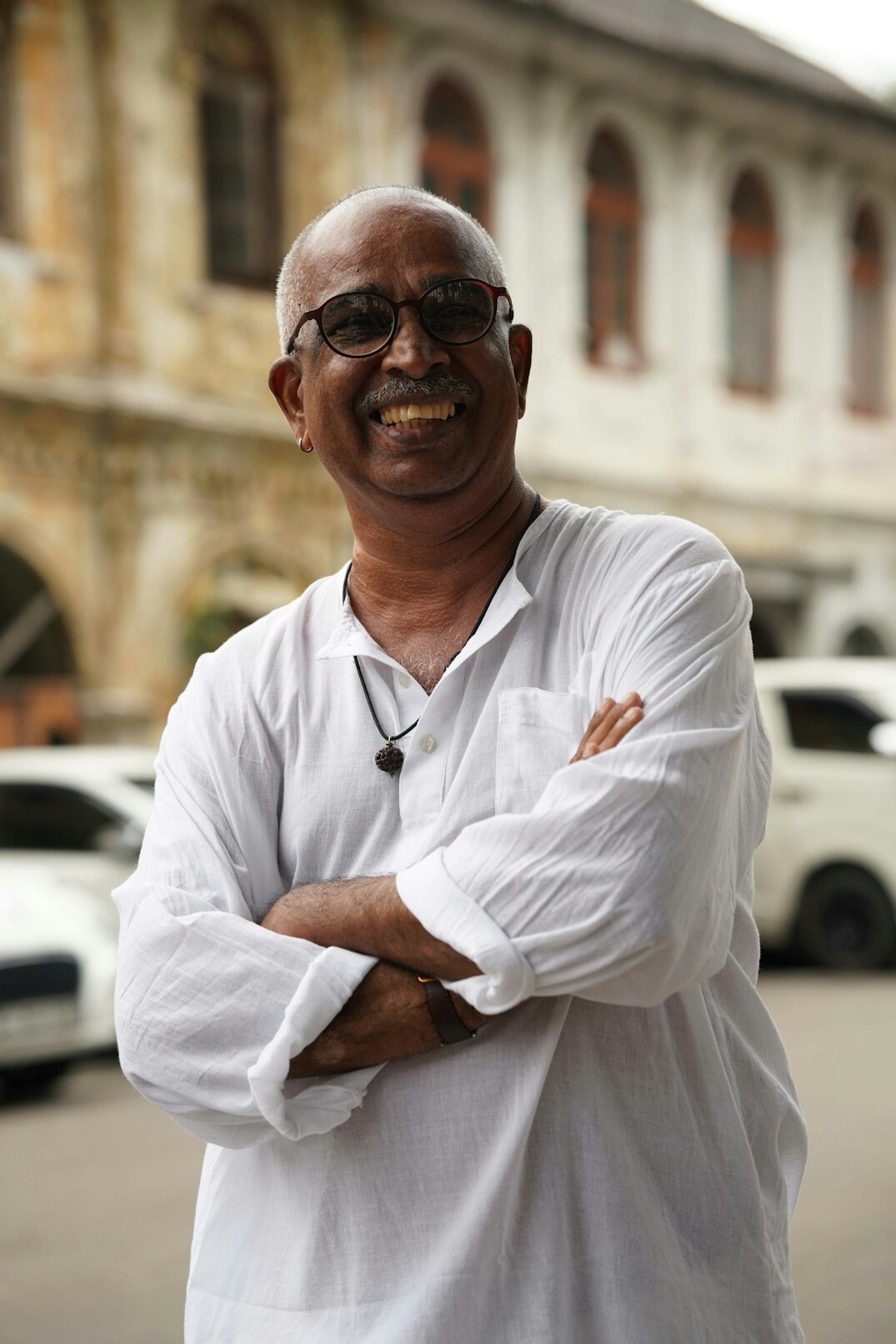 Portrait of a middle aged man in glasses smiling